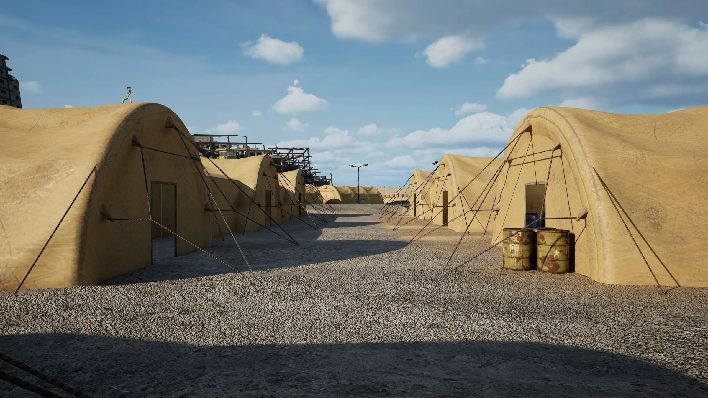 The military base: a row of tents and fuel drums