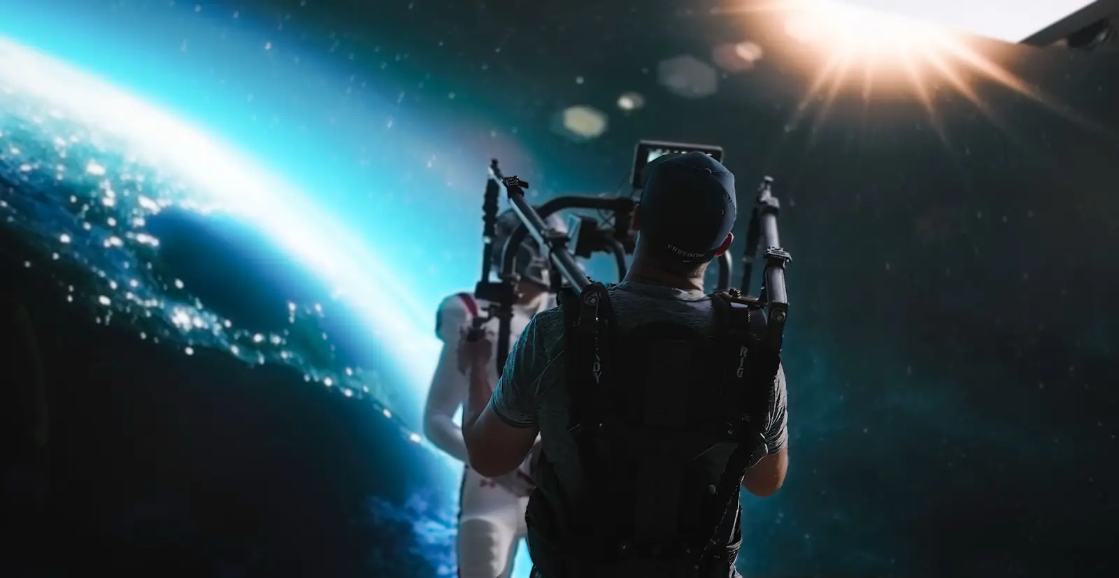Steadicam on a Navy football shoot, Earth glowing on the LED wall behind