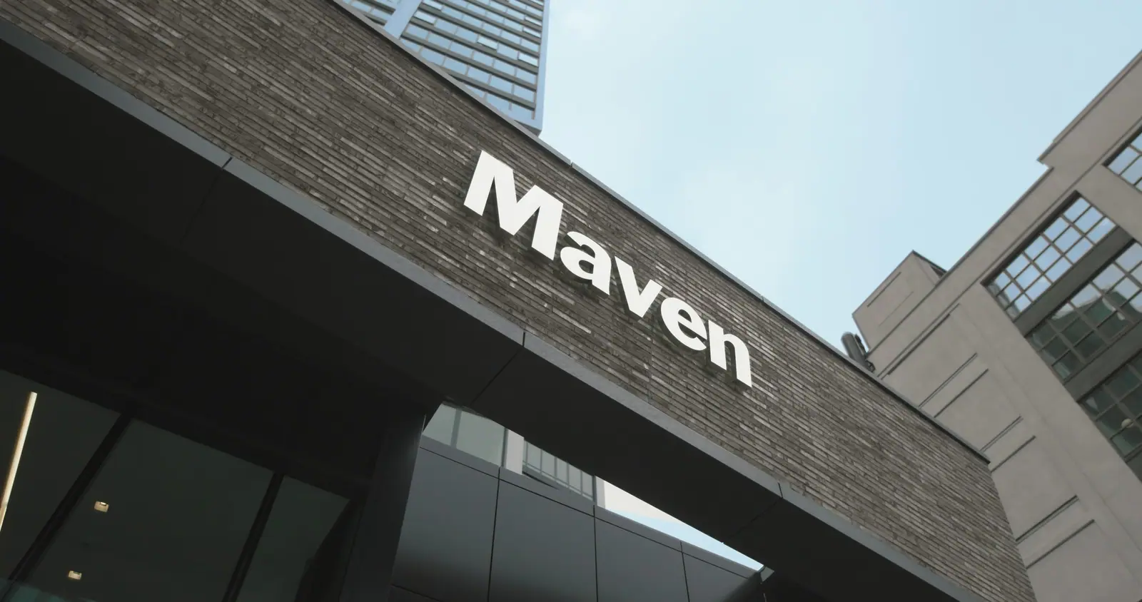 The Maven sign on the building, from below